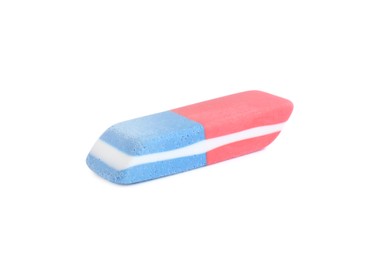 Photo of New double eraser isolated on white. School stationery