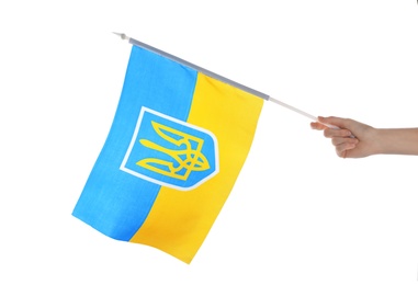 Photo of Woman holding national flag of Ukraine on white background, closeup