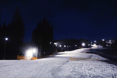 Beautiful landscape with ski track at night. Winter vacation