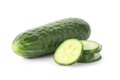 Photo of Whole and sliced fresh cucumbers on white background