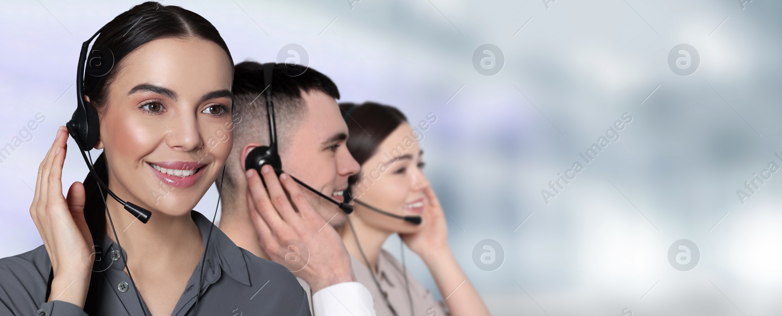 Image of Hotline operators with headsets in office, space for text. Banner design