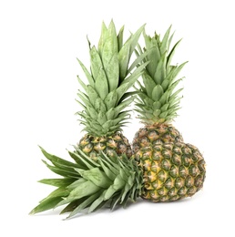 Photo of Fresh ripe juicy pineapples isolated on white