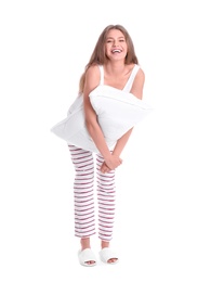 Photo of Happy woman in pajamas with pillow on white background