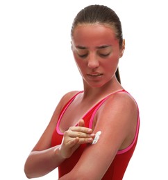 Photo of Woman applying cream on sunburn against white background