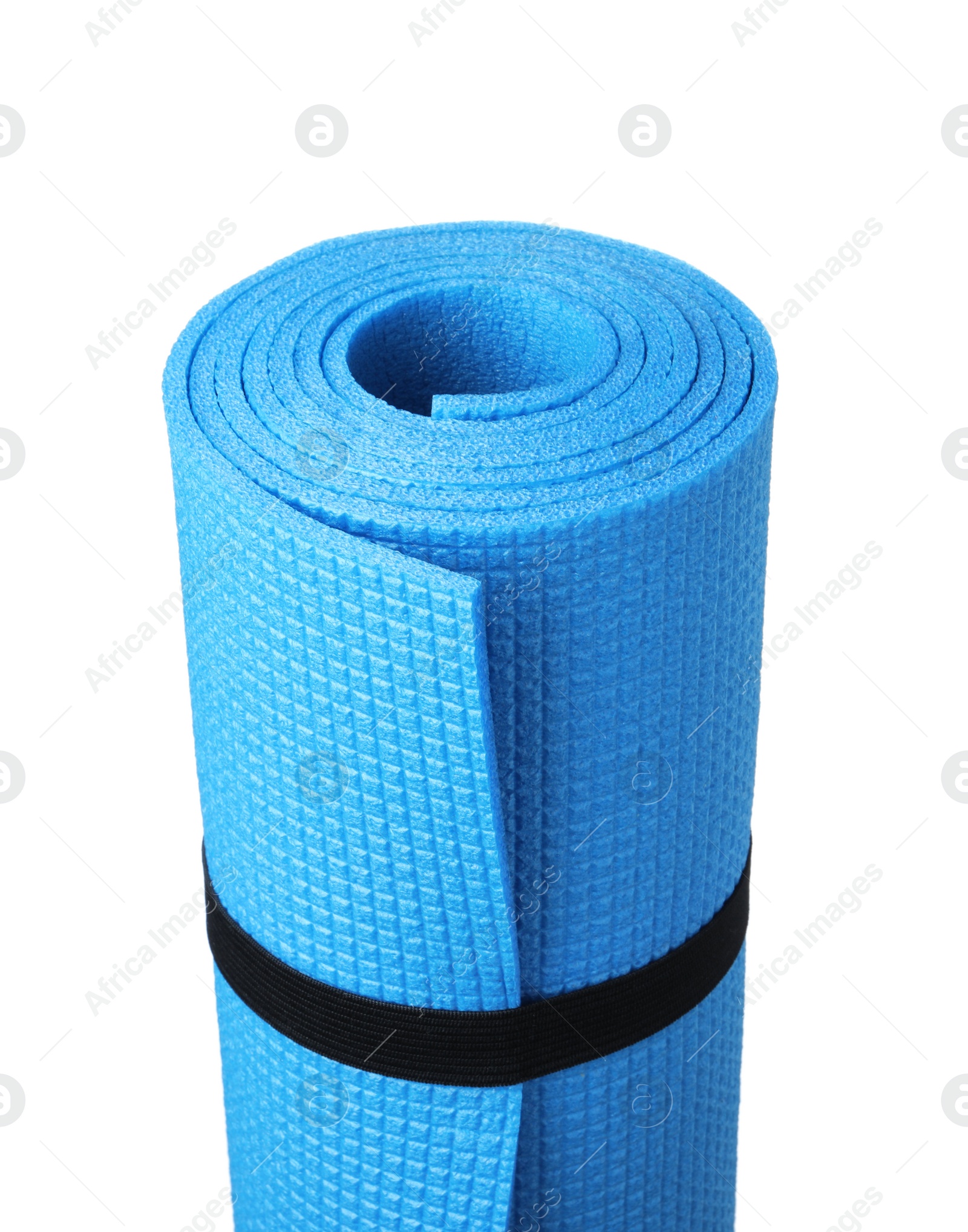 Photo of Rolled camping mat on white background, closeup