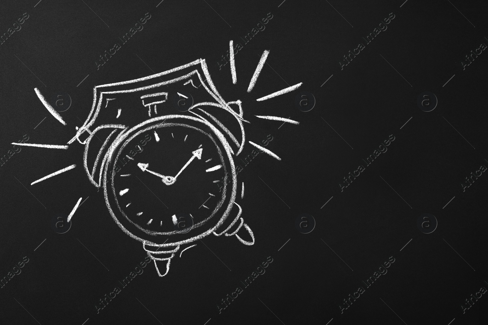 Photo of Drawn alarm clock on blackboard, space for text. School time