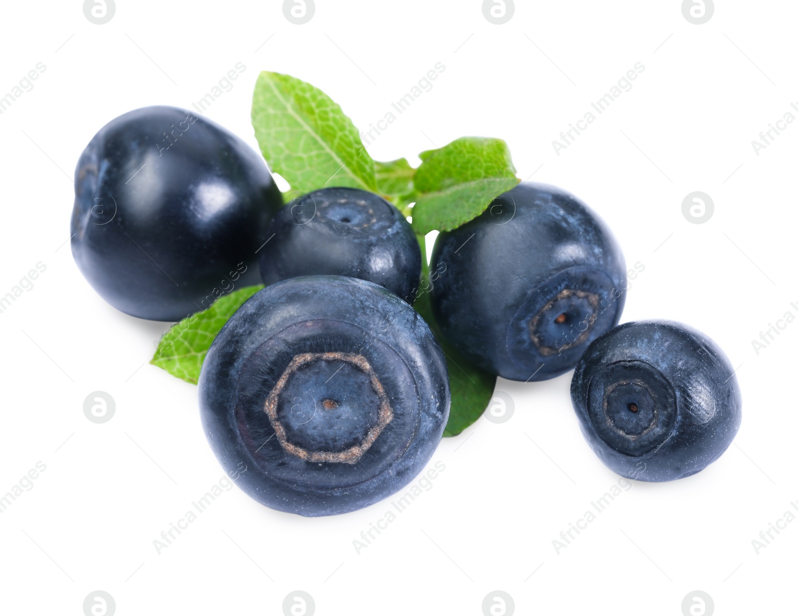 Photo of Tasty ripe bilberries and green leaves isolated on white