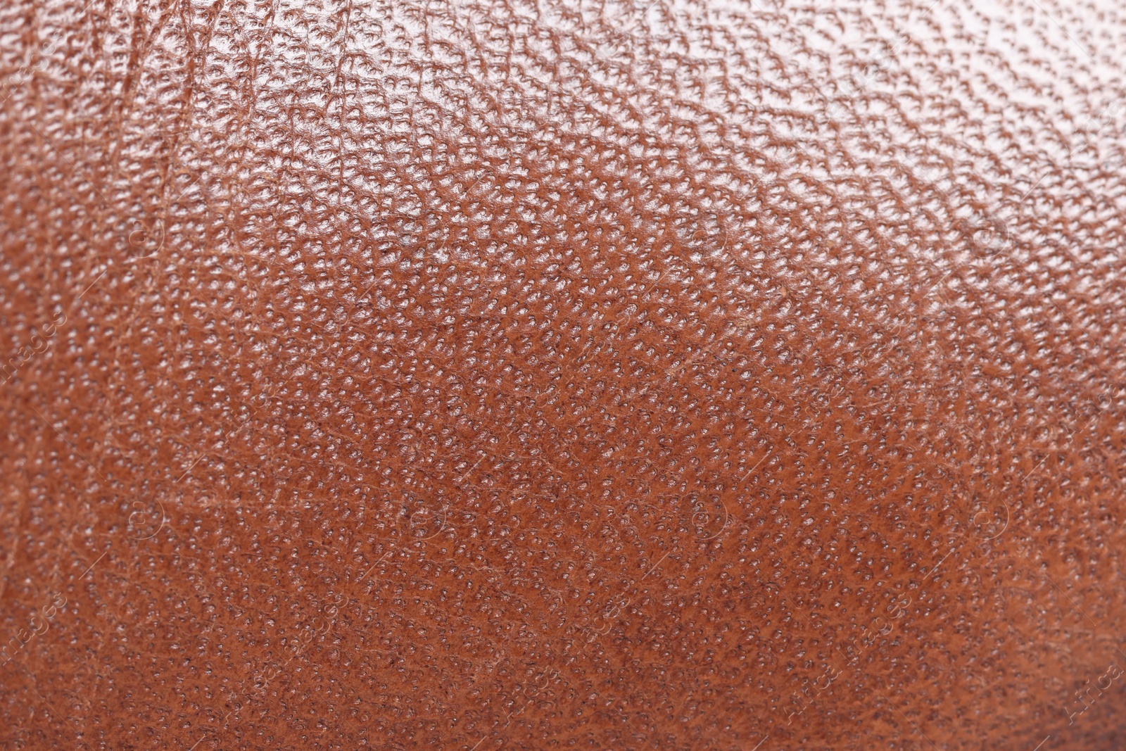 Photo of Brown natural leather as background, top view