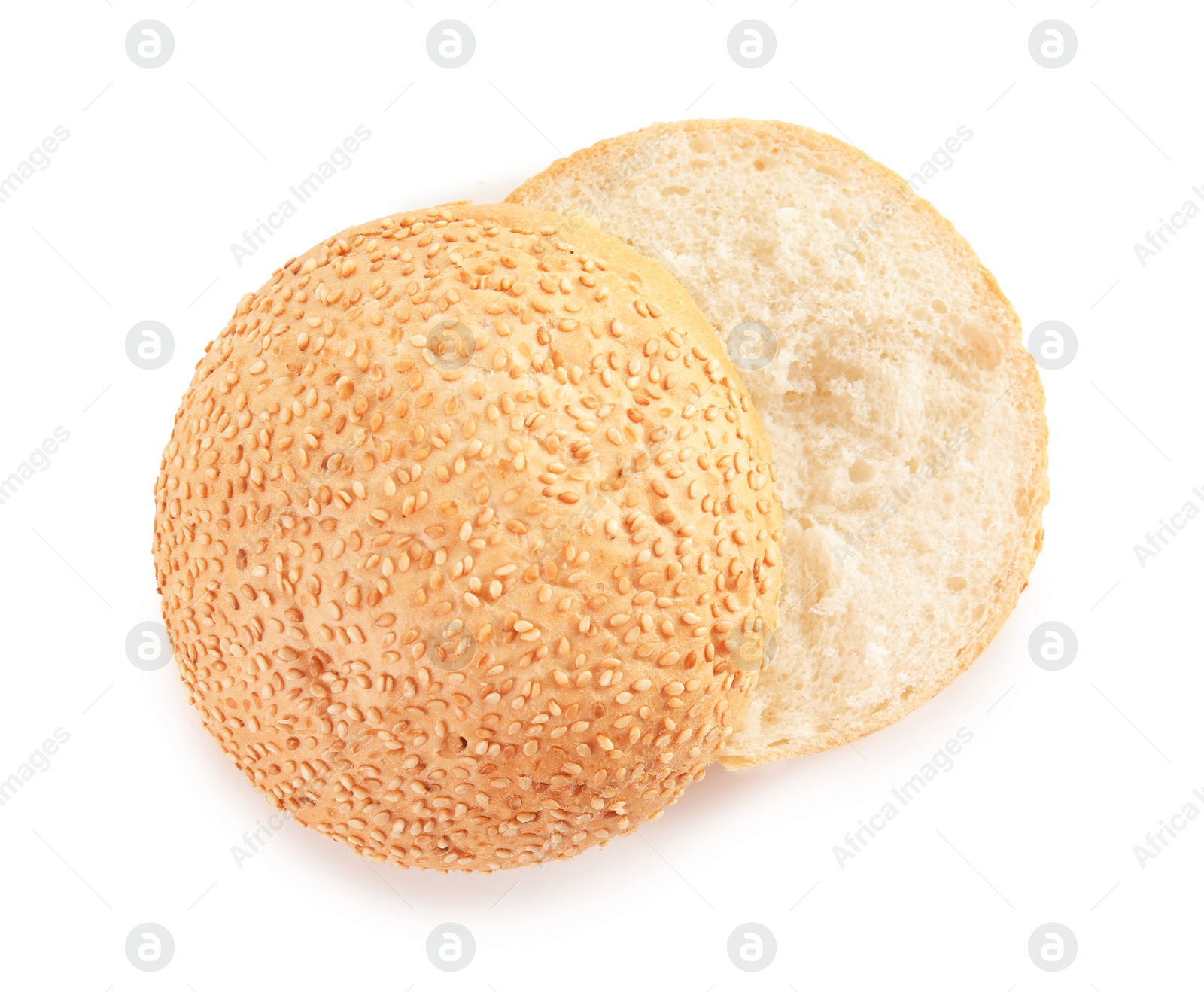 Photo of Sliced hamburger bun on white background, top view. Bread product