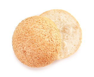 Photo of Sliced hamburger bun on white background, top view. Bread product