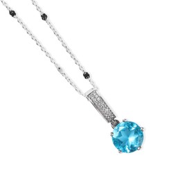 Photo of Elegant silver necklace with light blue gemstone isolated on white, top view. Luxury jewelry