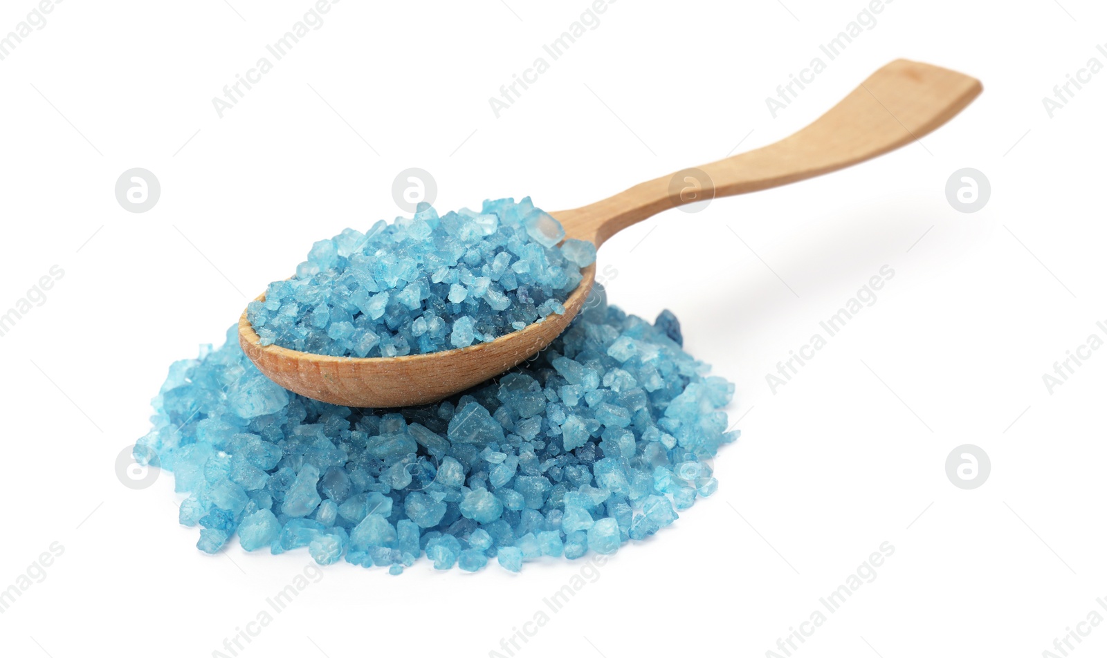 Photo of Blue sea salt and spoon isolated on white