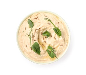 Bowl of tasty hummus with pea leaves isolated on white, top view