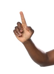 African-American man pointing at something on white background, closeup