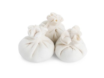 Uncooked khinkali (dumplings) isolated on white. Georgian cuisine