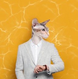Image of Portrait of businessman with cat face on yellow background