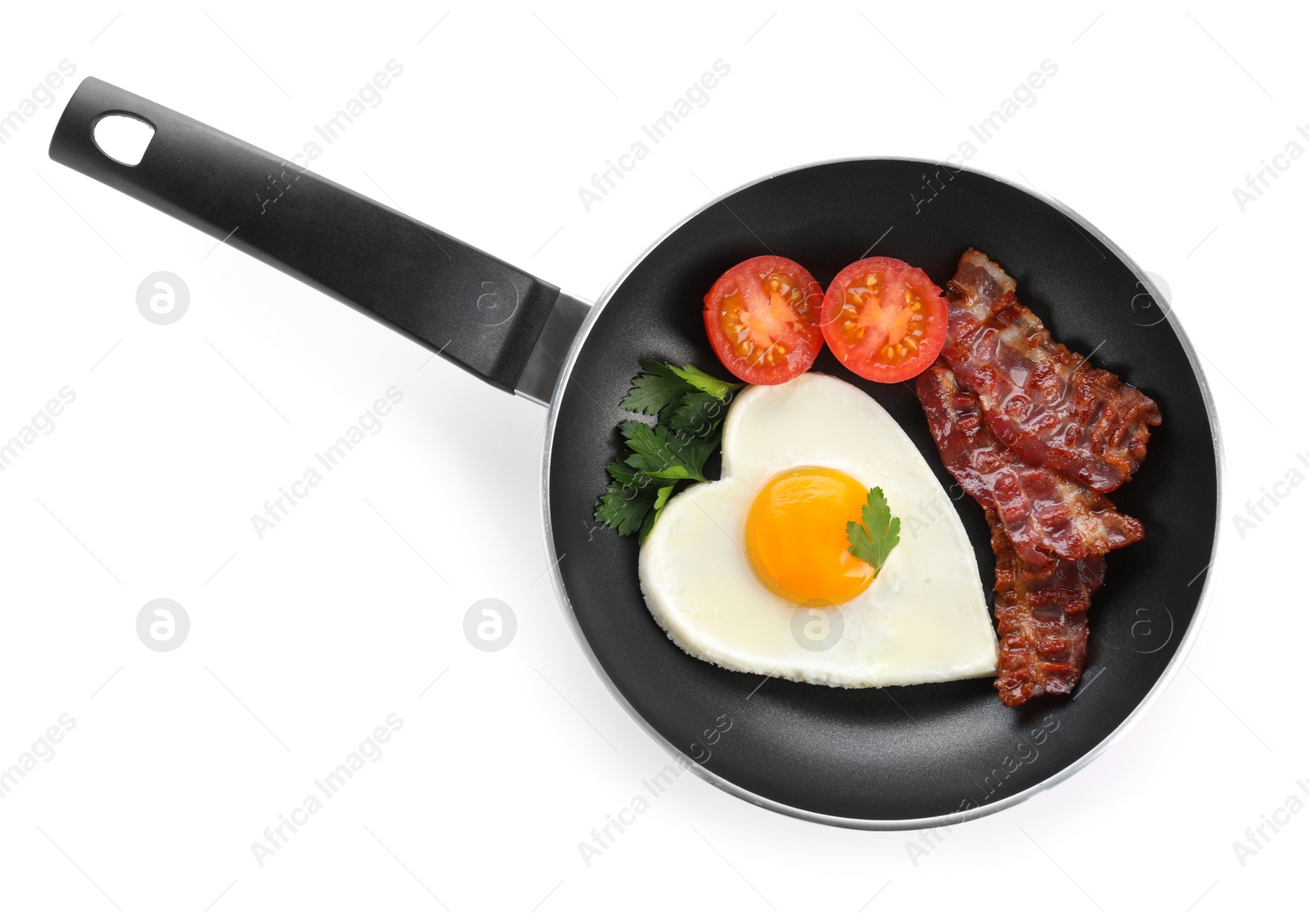 Photo of Tasty breakfast with heart shaped fried egg isolated on white, top view