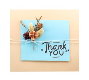 Photo of Card with phrase Thank You and dried flowers isolated on white