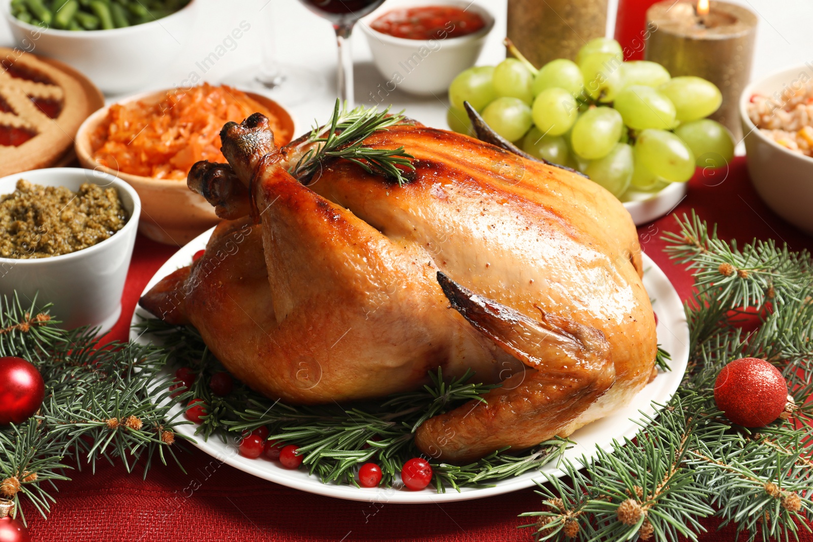 Photo of Traditional festive dinner with delicious roasted turkey served on table