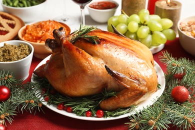 Traditional festive dinner with delicious roasted turkey served on table