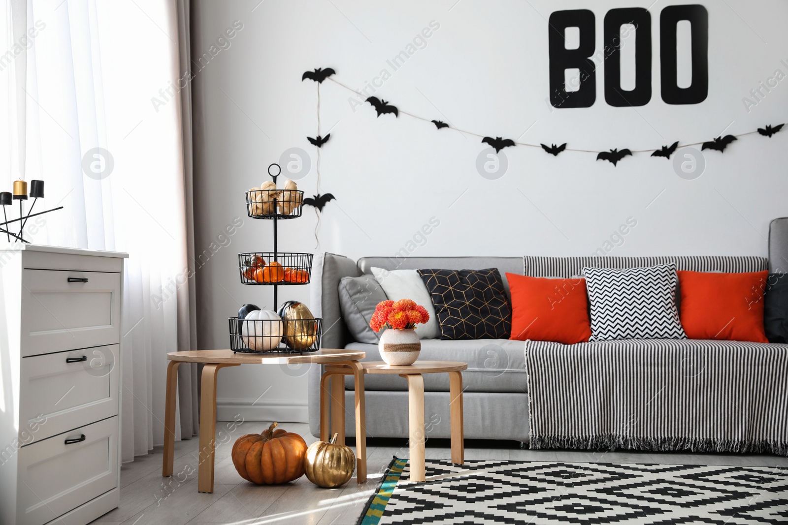 Photo of Modern room decorated for Halloween. Festive interior