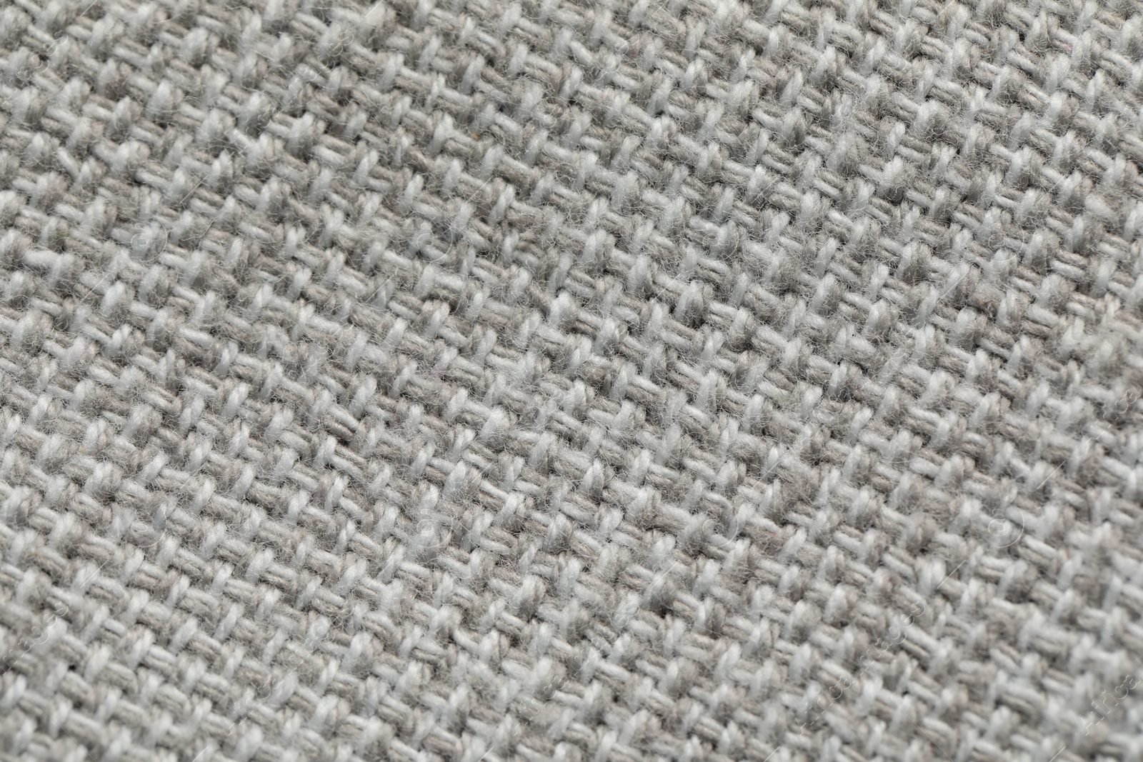 Photo of Texture of soft light grey fabric as background, top view