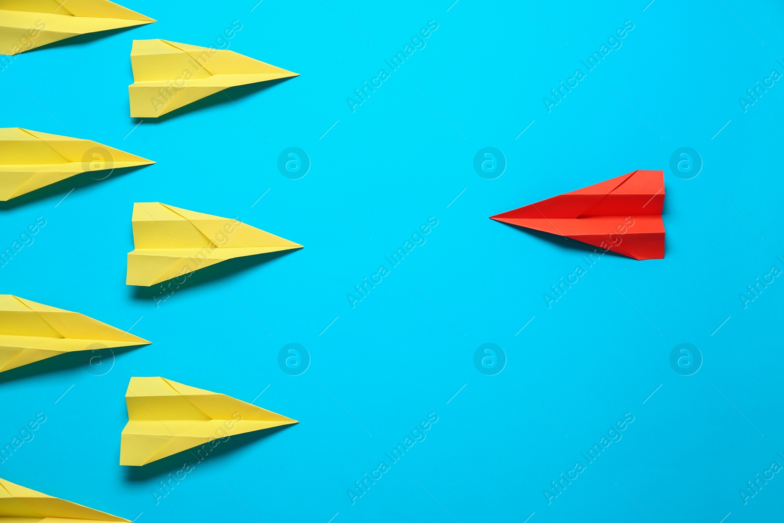 Photo of Flat lay composition with different paper planes on light blue background