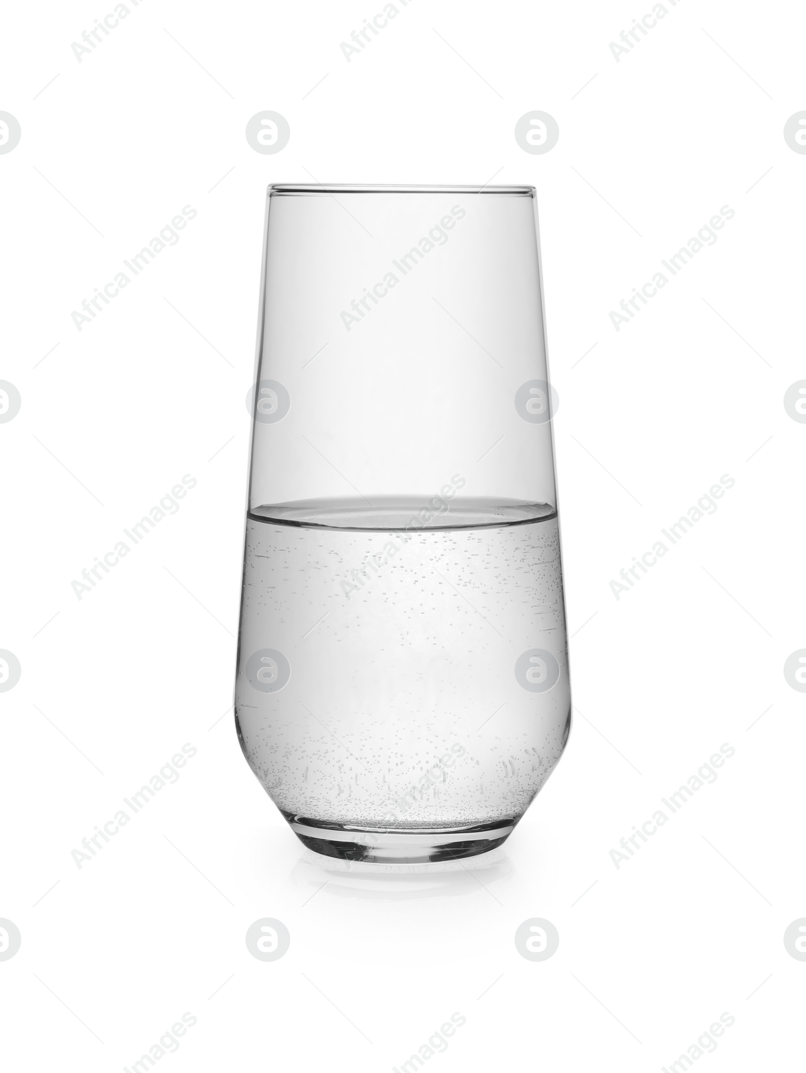 Photo of High glass with clear water isolated on white