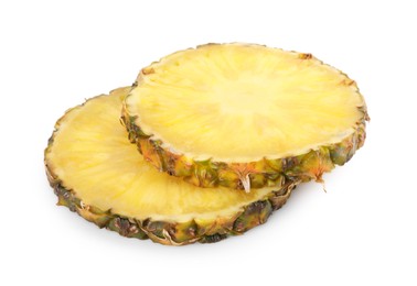 Photo of Slices of tasty ripe pineapple isolated on white