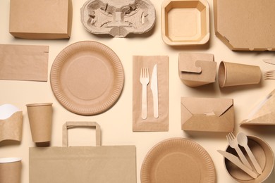 Flat lay composition with eco friendly food packagings on beige background