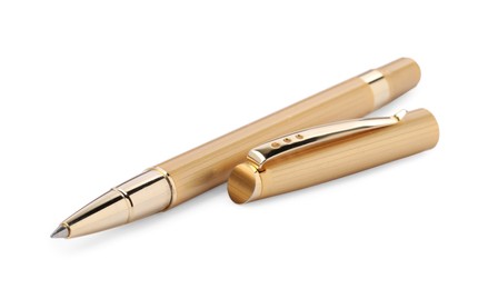 New stylish golden pen isolated on white, closeup