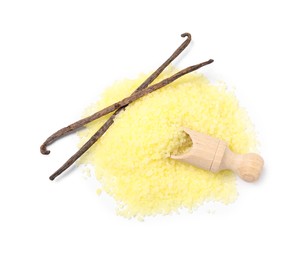 Yellow sea salt, vanilla pods and scoop isolated on white, top view