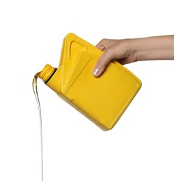 Photo of Man pouring motor oil from yellow container on white background, closeup
