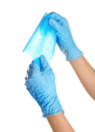 Photo of Doctor in medical gloves holding cloth on white background