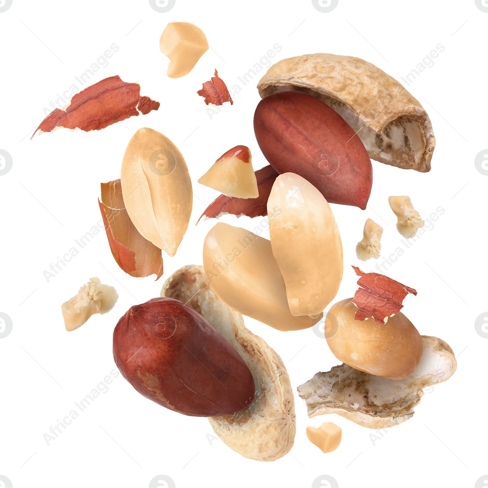 Image of Peanuts and crushed pods in air on white background