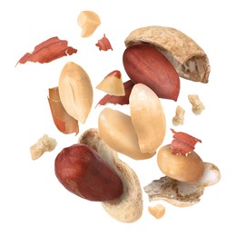 Image of Peanuts and crushed pods in air on white background