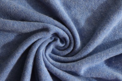 Photo of Beautiful blue fabric as background, top view