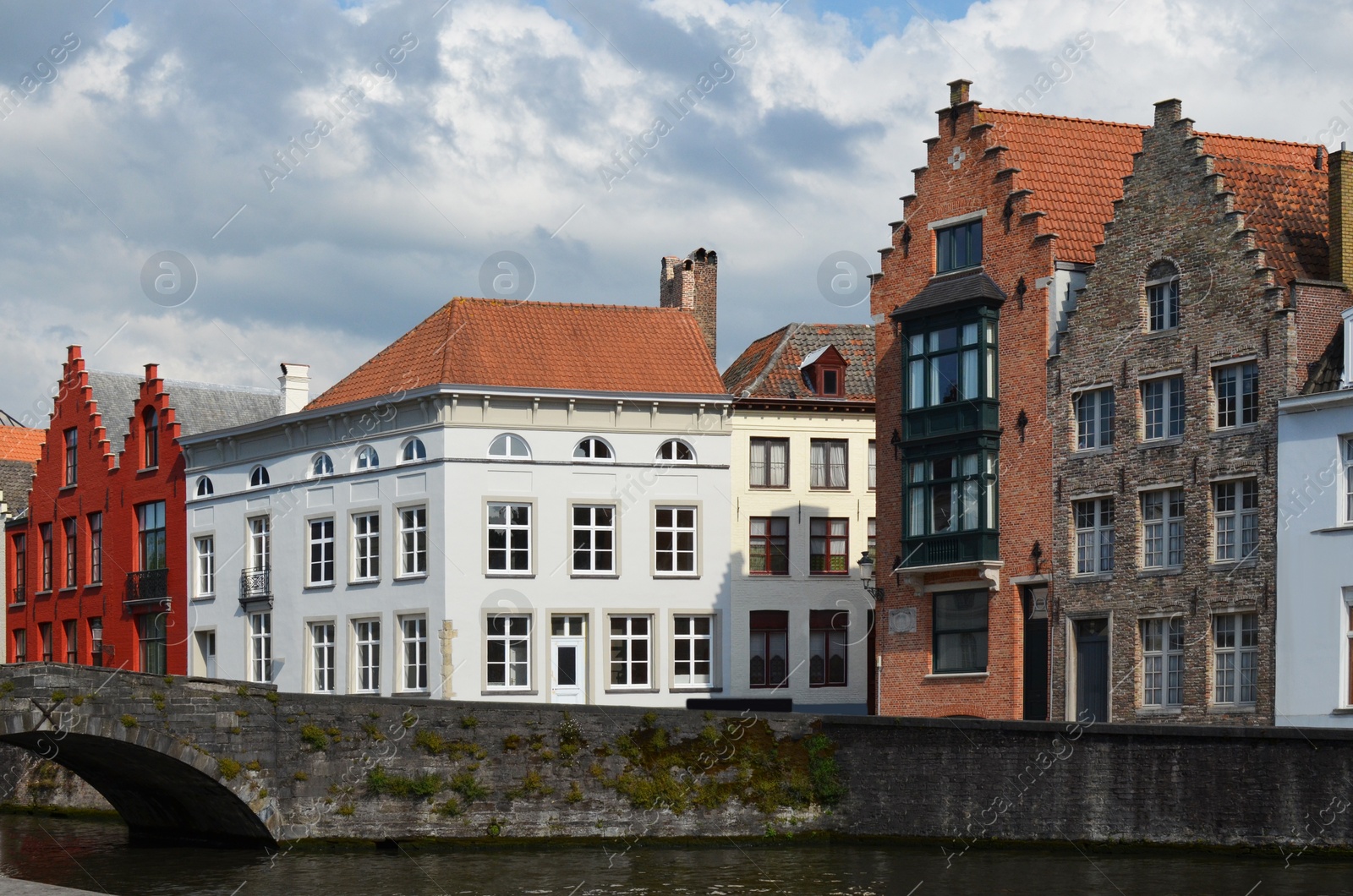 Photo of Beautiful view of ancient buildings along canal