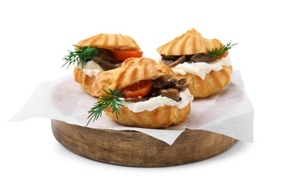 Delicious profiteroles with cream cheese, mushrooms, tomato and dill isolated on white