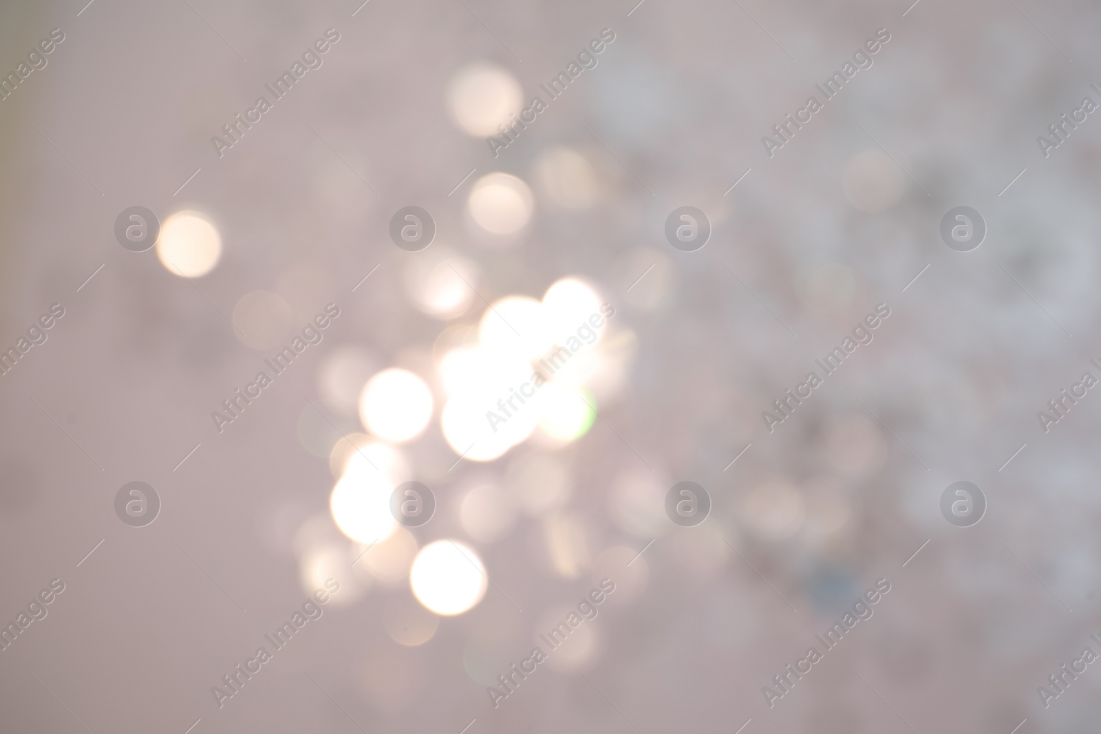 Photo of Shiny lilac background with magical bokeh effect