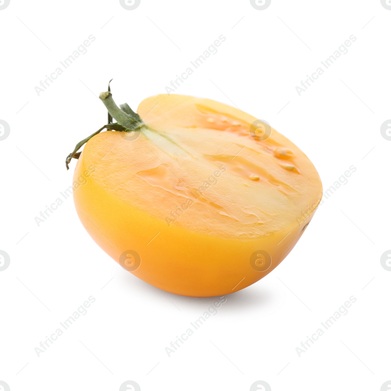 Photo of Piece of delicious ripe yellow tomato isolated on white