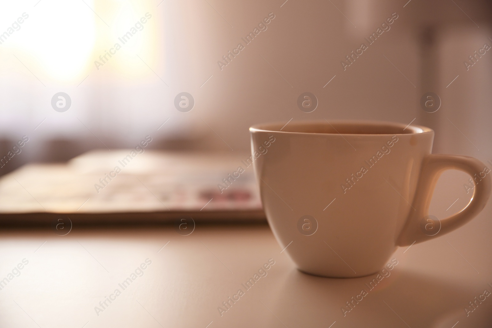 Photo of Cup of hot drink on table, space for text. Lazy morning