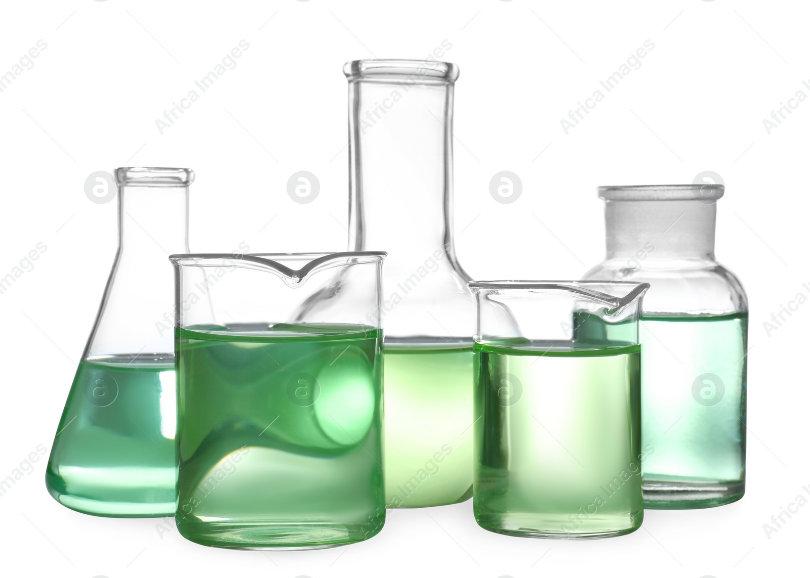 Photo of Glassware with liquids isolated on white. Laboratory analysis