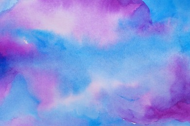 Abstract colorful watercolor painting as background, top view