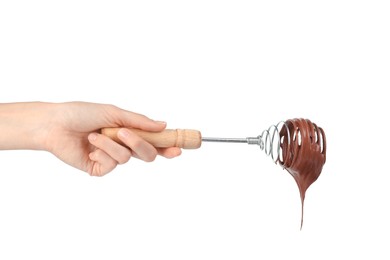 Photo of Woman holding whisk with chocolate cream isolated on white, closeup