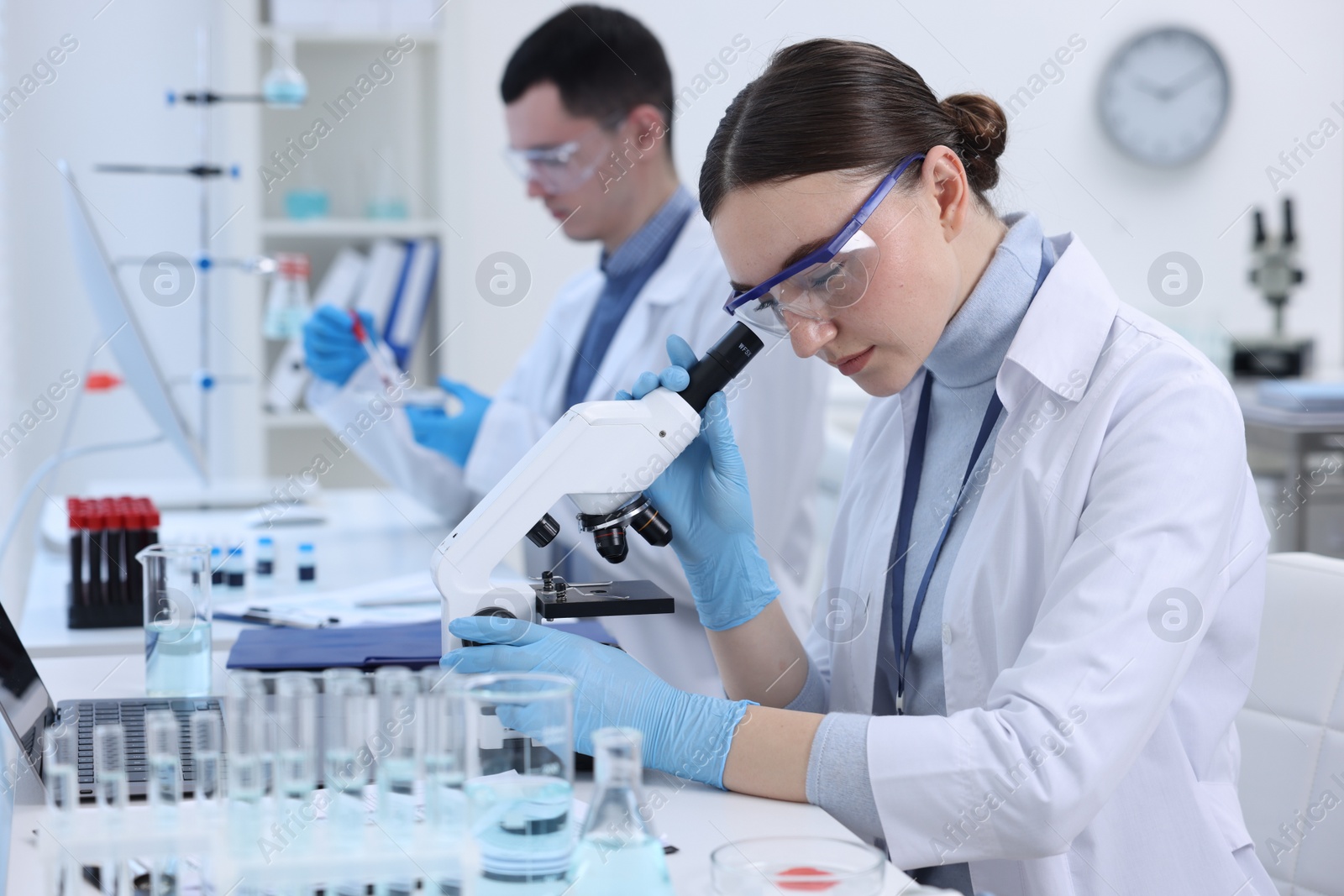 Photo of Scientists working with samples in laboratory. Medical research