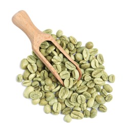 Wooden scoop with green coffee beans on white background, top view