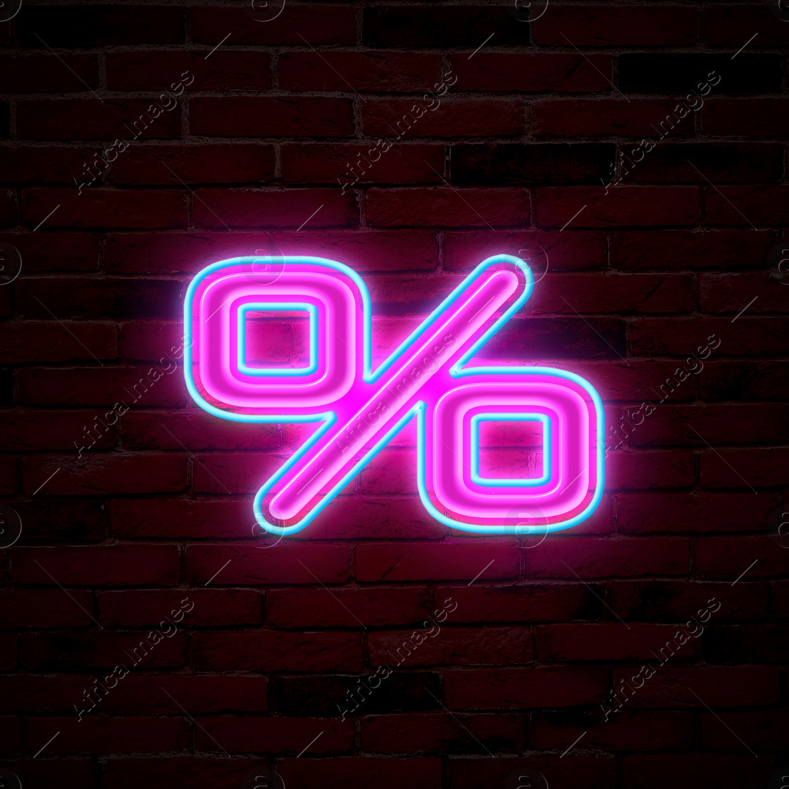 Image of Glowing neon percent sign on brick wall