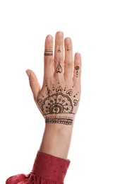 Photo of Woman with beautiful henna tattoo on hand against white background, closeup. Traditional mehndi