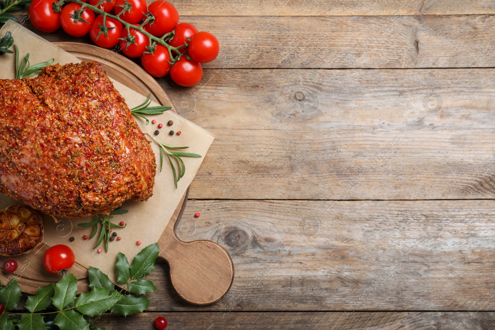 Photo of Homemade delicious ham on wooden background, flat lay with space for text. Festive dinner